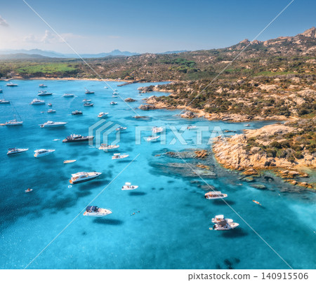 Aerial view of luxury yachts and boats on blue sea, island Aerial view of luxury yachts and boats on blue sea, island 140915506