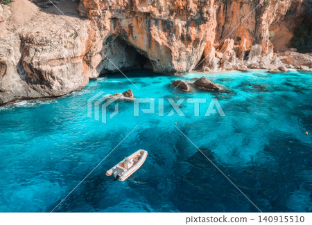 Aerial view of yacht and boats on blue sea at sunny day in summer Aerial view of yacht and boats on blue sea at sunny day in summer 140915510