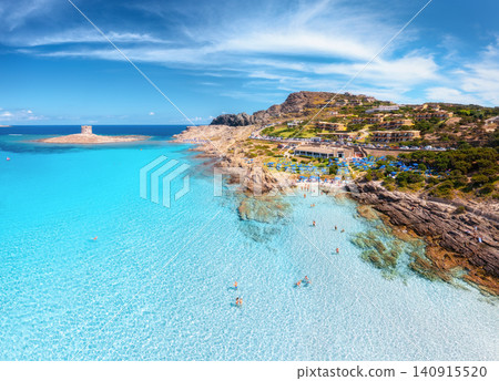 Aerial drone view of La Pelosa sandy beach and blue sea in summer Aerial drone view of La Pelosa sandy beach and blue sea in summer 140915520