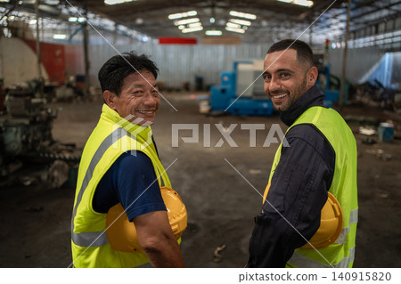 Workers Factory or Engineering work at factory site check up machine or products in site Workers Factory or Engineering work at factory site check up machine or products in site 140915820