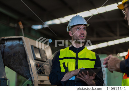 Workers Factory or Engineering work at factory site check up machine or products in site Workers Factory or Engineering work at factory site check up machine or products in site 140915841