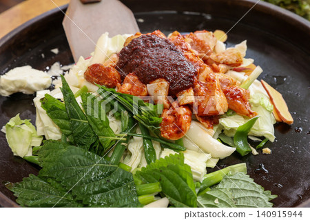 Raw Spicy Korean Chicken Stir Fry Dakgalbi with Vegetables Raw Spicy Korean Chicken Stir Fry Dakgalbi with Vegetables 140915944