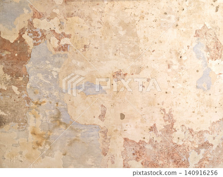Old plaster wall showing peeling paint texture Old plaster wall showing peeling paint texture 140916256