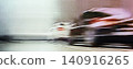 Racing car speeding on a track with motion blur 140916265
