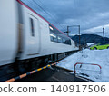 Nagano Electric Railway Snow Monkey train and Yudanaka Station platform 140917506