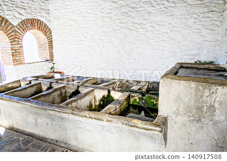 Arab washhouses, heritage of the unique village of Pampaneira in the Alpujarra region of Granada, Andalusia Arab washhouses, heritage of the unique village of Pampaneira in the Alpujarra region of Granada, Andalusia 140917508