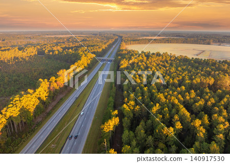 Highway road in USA. American freeway road with fast driving cars. Transportation infrastructure in North Carolina Appalachian mountains Highway road in USA. American freeway road with fast driving cars. Transportation infrastructure in North Carolina Appalachian mountains 140917530