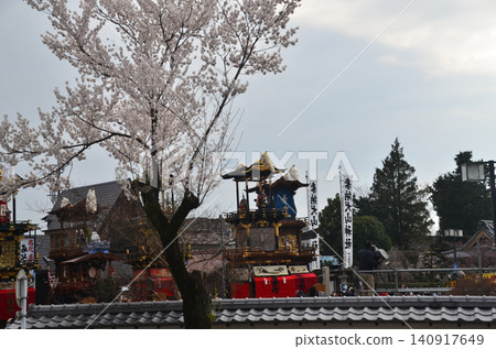 Inuyama City, Aichi Prefecture, Japan: The Inuyama Festival in spring, with cherry blossoms in full bloom, and the sight of floats and mechanical puppets being offered at the Inuyama Castle Square. Inuyama City, Aichi Prefecture, Japan: The Inuyama Festival in spring, with cherry blossoms in full bloom, and the sight of floats and mechanical puppets being offered at the Inuyama Castle Square. 140917649