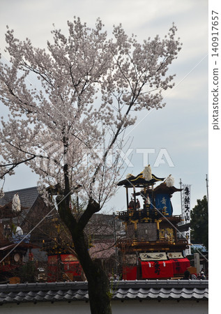 Inuyama City, Aichi Prefecture, Japan: The Inuyama Festival in spring, with cherry blossoms in full bloom, and the sight of floats and mechanical puppets being offered at the Inuyama Castle Square. Inuyama City, Aichi Prefecture, Japan: The Inuyama Festival in spring, with cherry blossoms in full bloom, and the sight of floats and mechanical puppets being offered at the Inuyama Castle Square. 140917657