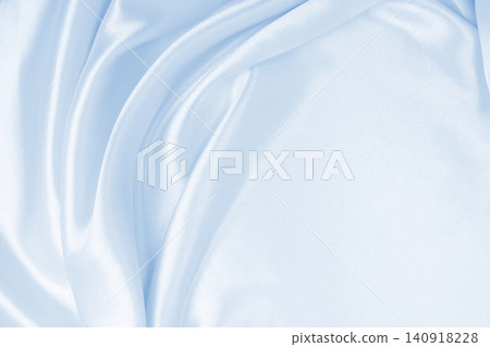Smooth elegant blue silk or satin luxury cloth texture as abstract background. Luxurious background design Smooth elegant blue silk or satin luxury cloth texture as abstract background. Luxurious background design 140918228