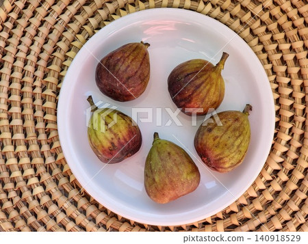 Collection of Fresh Ripe Common Figs on White Background Collection of Fresh Ripe Common Figs on White Background 140918529