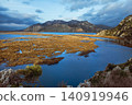 View of Dalyan River Delta and lagoon near Iztuzu Beach known as Turtle beach, Turkey. Wetlands, mountains and calm waterways create popular destination for summer travel, wildlife and nature tourism. 140919946
