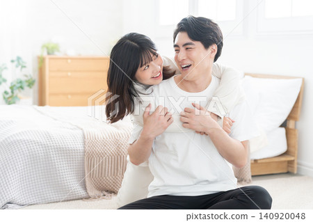 Young couples hugging Young couples hugging 140920048