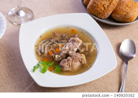 Pearl barley soup with pork and mushrooms 140920382