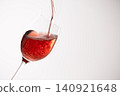 Red wine poured into a glass 140921648