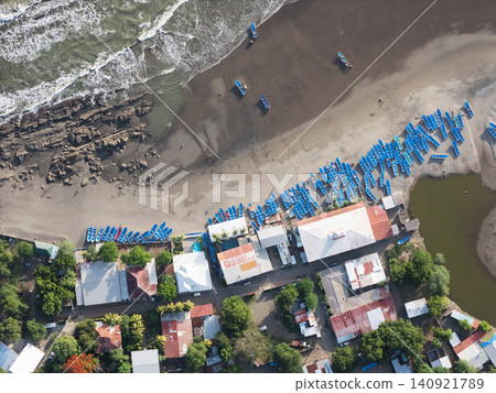 Many blue fishing boats on beach Many blue fishing boats on beach 140921789