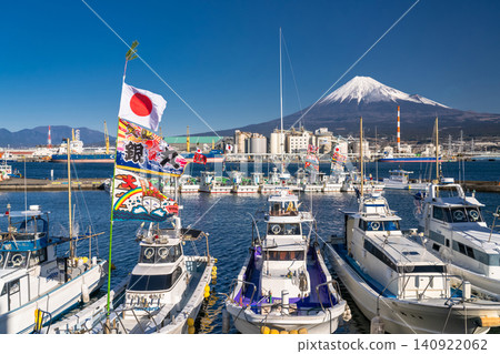 Mount Fuji and fishing boats flying large fishing flags - Tagonoura Fishing Port on New Year's Day Mount Fuji and fishing boats flying large fishing flags - Tagonoura Fishing Port on New Year's Day 140922062