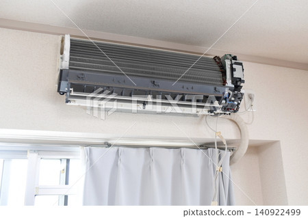 Disassembled household air conditioner interior Disassembled household air conditioner interior 140922499