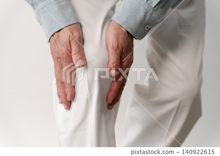 A senior man in casual clothes standing – a lifestyle image. 140922615