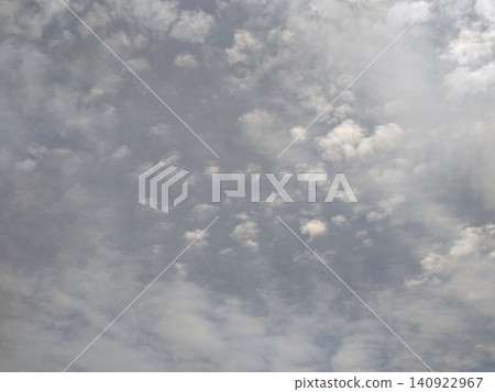 The texture of cirrocumulus clouds and pale clouds spreading across the summer sky The texture of cirrocumulus clouds and pale clouds spreading across the summer sky 140922967