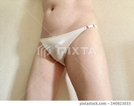A man with metabolic syndrome in his underwear, facing right, wearing white. A man with metabolic syndrome in his underwear, facing right, wearing white. 140923033