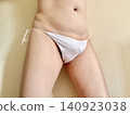 A man with metabolic syndrome in his underwear, facing left, white. 140923038
