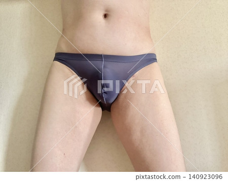 A man with metabolic syndrome in his underwear, front view, blue. A man with metabolic syndrome in his underwear, front view, blue. 140923096