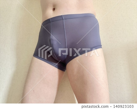 A man with metabolic syndrome in his underwear, facing right, wearing blue. A man with metabolic syndrome in his underwear, facing right, wearing blue. 140923103