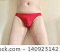 A man with metabolic syndrome in his underwear, front view, red. 140923142