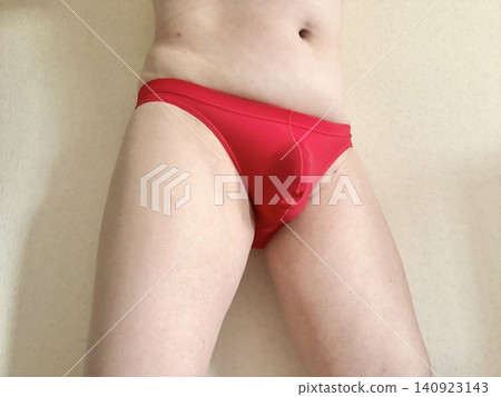 A man with metabolic syndrome in his underwear, facing left, wearing red. A man with metabolic syndrome in his underwear, facing left, wearing red. 140923143