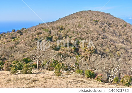Izu Peninsula, Izu Mountain Ridge Trail, Misoudai viewed from the grassy area at the saddle. Izu Peninsula, Izu Mountain Ridge Trail, Misoudai viewed from the grassy area at the saddle. 140923783