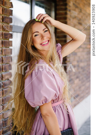 Happy Woman Smiling In Pink Summer Dress 140923908