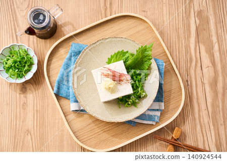 Hiyayakko: A summer side dish of firm tofu topped with condiments. Hiyayakko: A summer side dish of firm tofu topped with condiments. 140924544