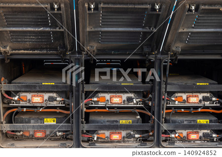 Electric bus at the EV charging station, Industrial battery storage energy of electric bus, Electric bus charging station, Battery electric bus. 140924852