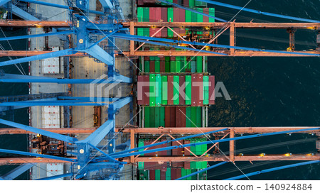 Aerial view container ship loaded with cargo box at commercial port terminal, Global business logistic international trade maritime transportation by container ship, Container ship at commercial port. 140924884