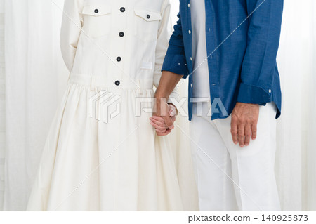 Woman and man standing side by side Lifestyle image Woman and man standing side by side Lifestyle image 140925873