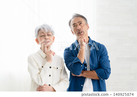 Woman and man standing side by side Lifestyle image Woman and man standing side by side Lifestyle image 140925874