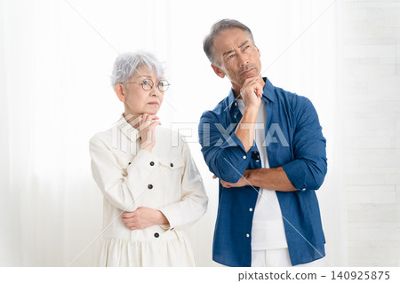 Woman and man standing side by side Lifestyle image Woman and man standing side by side Lifestyle image 140925875