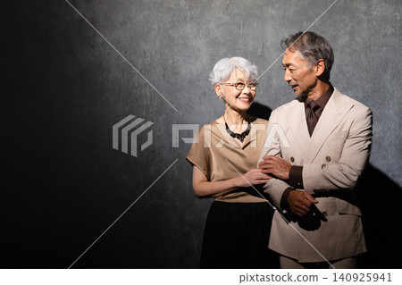 Senior men and women in informal clothing Lifestyle image Senior men and women in informal clothing Lifestyle image 140925941