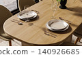 Elegant wooden dining table with tableware close up 140926685