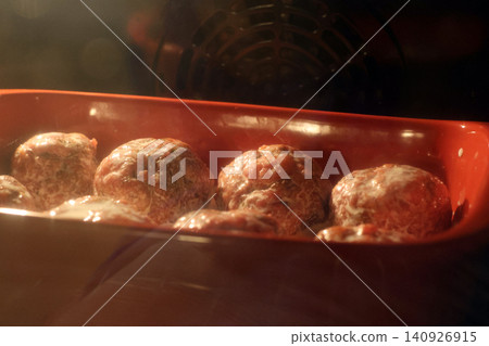 Homemade Meatballs Baking in Oven for Delicious Meal Preparation Homemade Meatballs Baking in Oven for Delicious Meal Preparation 140926915
