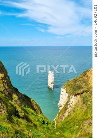 Scenic Coastal View with Limestone Rock Formation Against Clear Blue Sky and Ocean Scenic Coastal View with Limestone Rock Formation Against Clear Blue Sky and Ocean 140927101