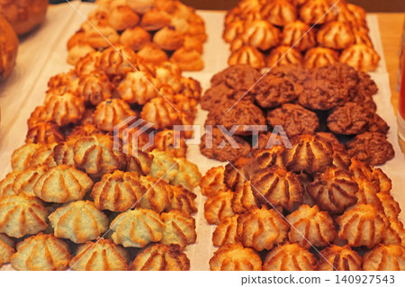 Assorted Coconut Macaroons and Cookies Display for Holiday Baking Inspiration 140927543