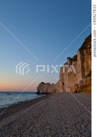Majestic Coastal Cliffs at Sunset - Serene Beachscape for Tranquil Escape and Natural Inspiration 140927615
