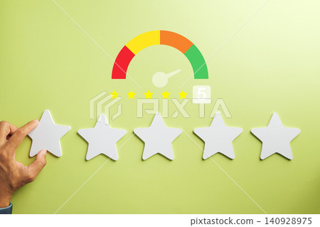 Hand carefully places final 5 star review, indicating customer feedback shows complete service satisfaction, online rating survey vividly displays excellent experience with green meter Hand carefully places final 5 star review, indicating customer feedback shows complete service satisfaction, online rating survey vividly displays excellent experience with green meter 140928975