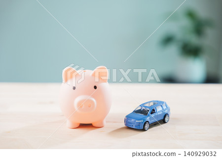 Piggy bank and car represent auto insurance, finance manages money and loan cost, people save and credit helps refinance and drive using saving plans for buying motor vehicles Piggy bank and car represent auto insurance, finance manages money and loan cost, people save and credit helps refinance and drive using saving plans for buying motor vehicles 140929032