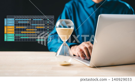 Hourglass time glass sand clock shows urgency for business growth and deadline, person manages project schedule planning with laptop to optimize tasks countdown timer concept Hourglass time glass sand clock shows urgency for business growth and deadline, person manages project schedule planning with laptop to optimize tasks countdown timer concept 140929033
