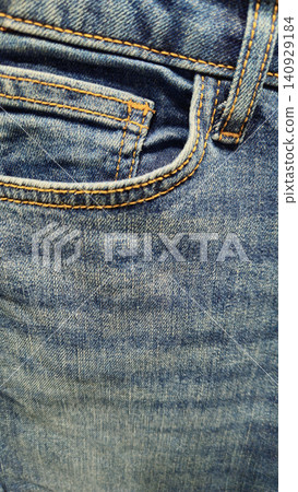 Close-up of blue denim jeans background Close-up of blue denim jeans background 140929184