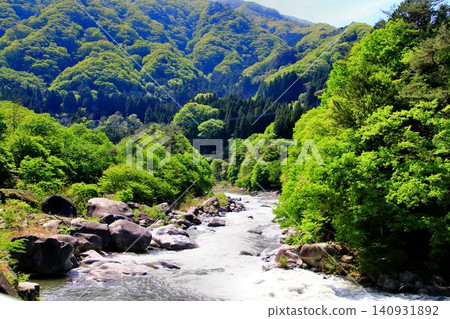 The vibrant green of early summer... The clear waters of the Watarase Gorge. The vibrant green of early summer... The clear waters of the Watarase Gorge. 140931892