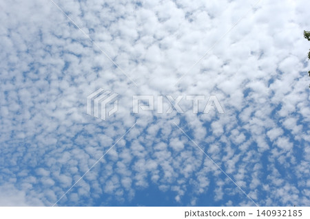 Celtic clouds floating in the spring blue sky 140932185